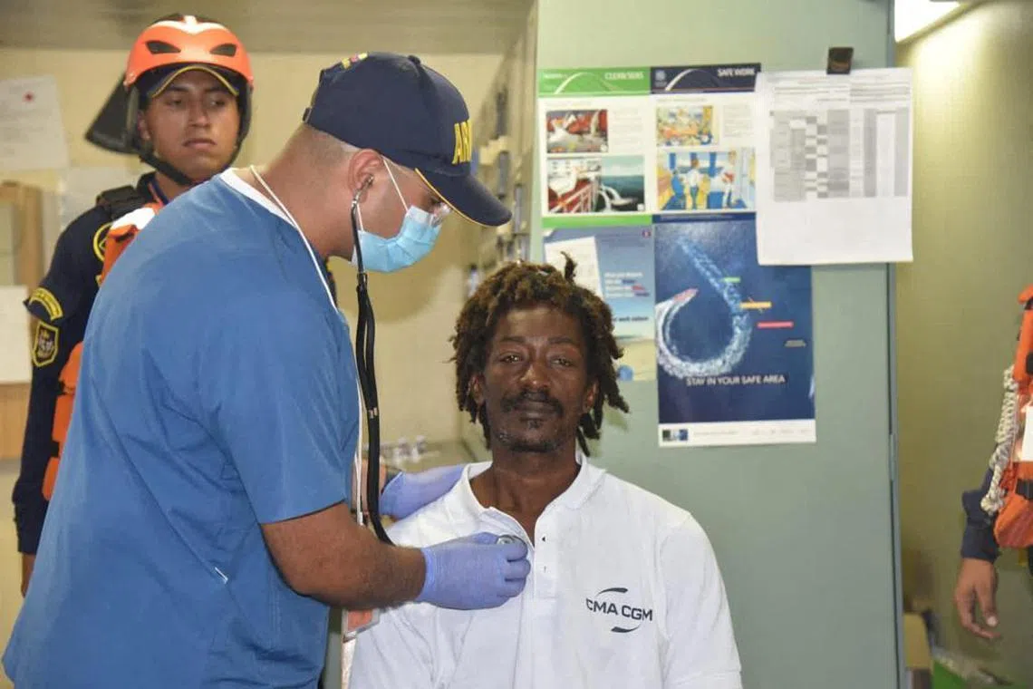 Elvis Francois is checked by a doctor after being lost at sea for almost a month.