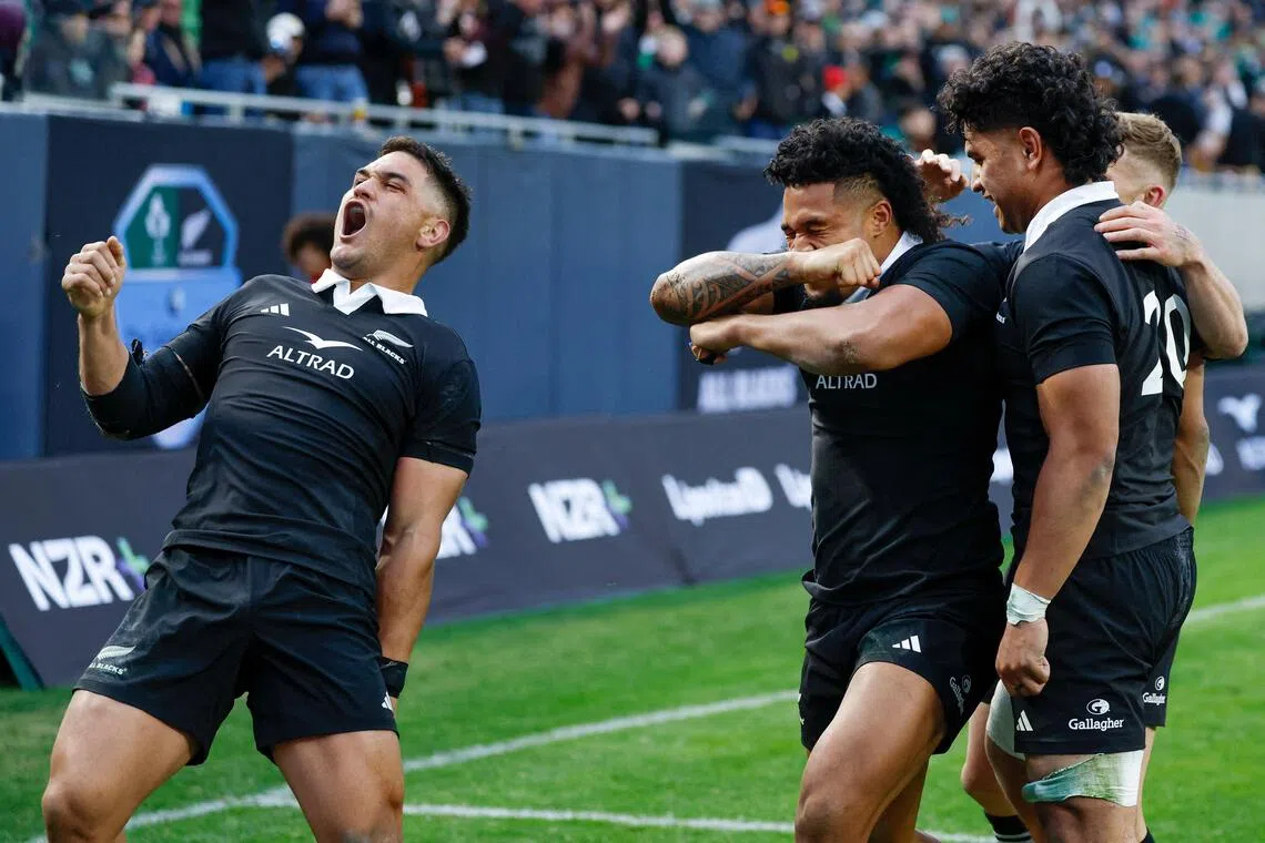 New Zealand's players celebrating after defeating Ireland 26-13 in the "Gallagher Cup" international rugby Test match at Soldier Field in Chicago, Illinois, on Nov 1, 2025. 