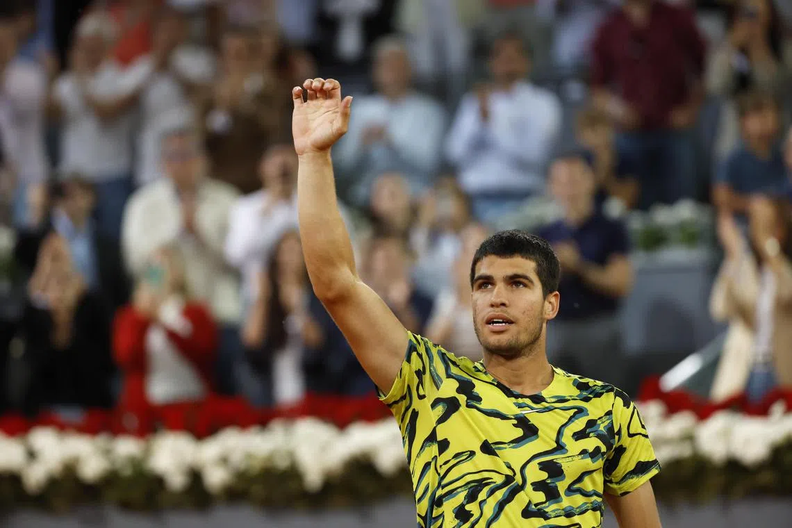Spain's Carlos Alcaraz celebrates his win against Grigor Dimitrov of Bulgaria at the Madrid Open.