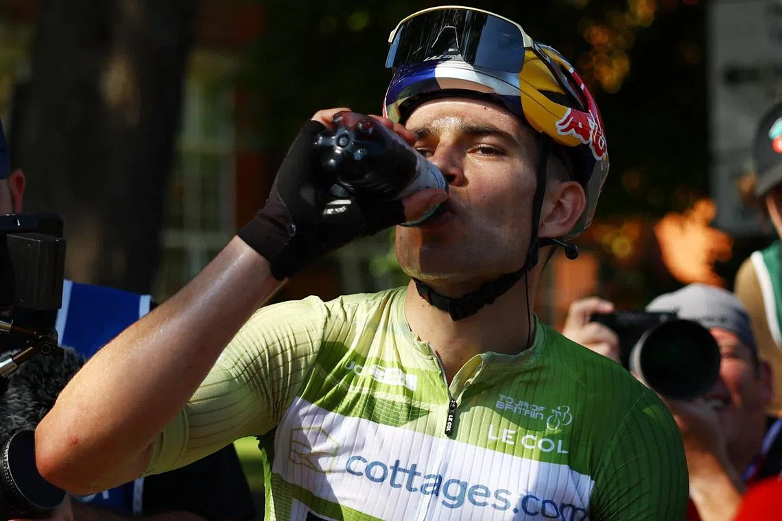 FILE PHOTO: Cycling - Tour of Britain - Stage 2 - Wrexham to Wrexham - Britain - September 4, 2023 Jumbo – Visma's Wout van Aert wearing the green jersey after finishing second in stage 2 REUTERS/Molly Darlington/File Photo