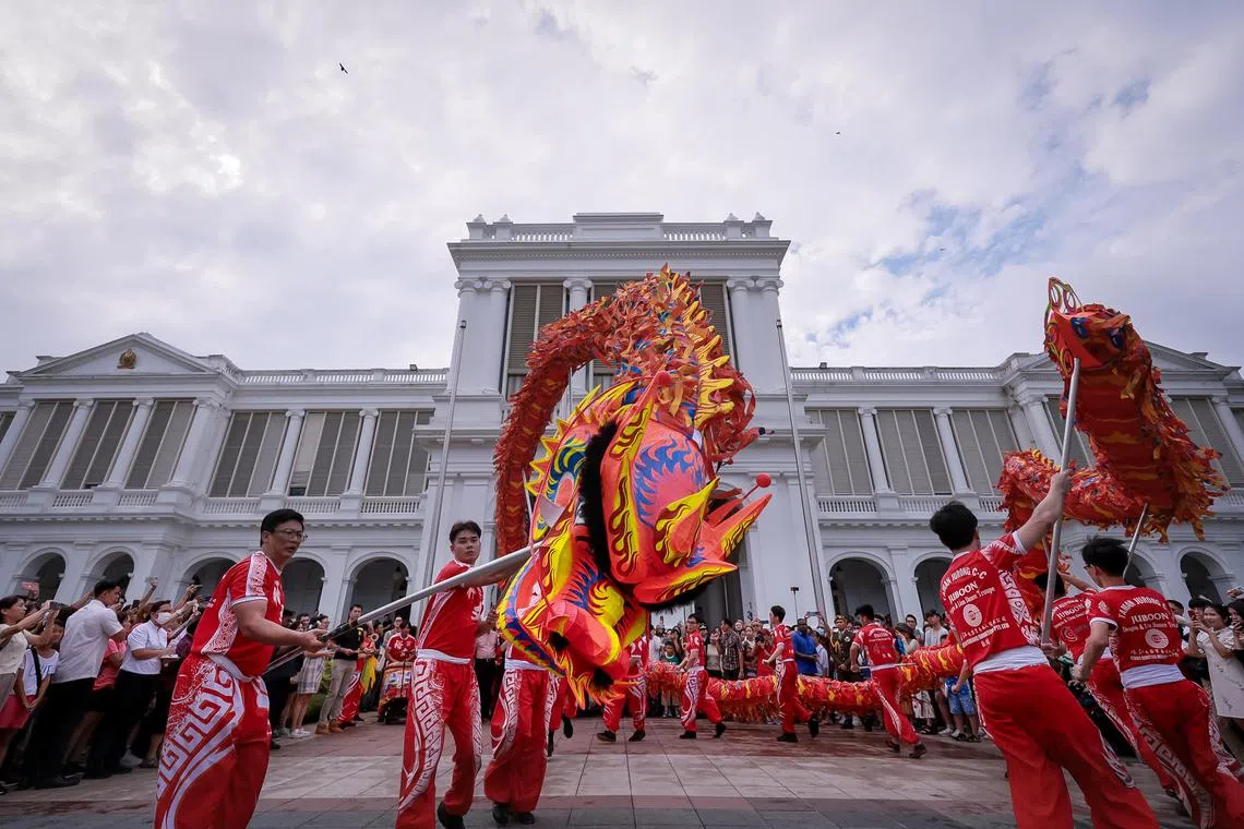 A dragon dance performance by Taman Jurong Community Club Juboon Dragon and Lion Dance Troupe during the Lunar New Year Istana Open House, Feb 12, 2024.