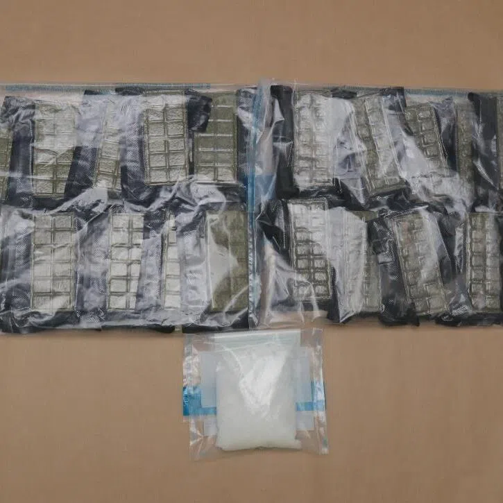 A plastic bag contained 261g of 'Ice' and two black bundles contained 2,261g of cannabis.