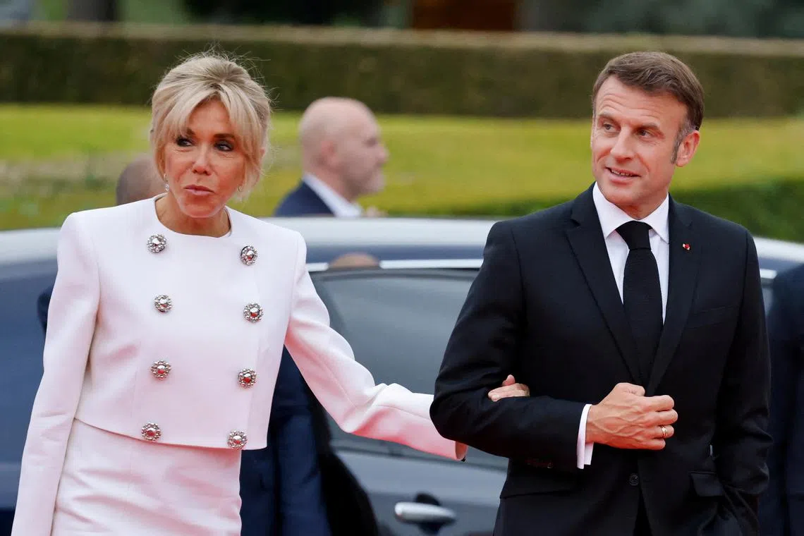 French President Emmanuel Macron and his wife Brigitte Macron attending an Olympic gala dinner in July 2024.