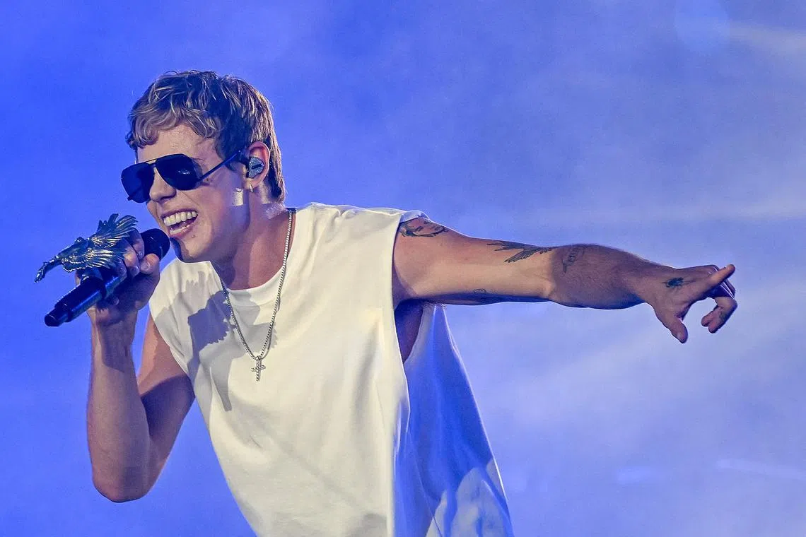 In a note to ticket buyers, Australian rapper The Kid Laroi wrote that his Asian tour was cancelled "due to circumstances beyond my control".