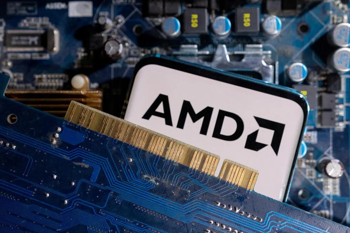 FILE PHOTO: A smartphone with a displayed AMD logo is placed on a computer motherboard in this illustration taken March 6, 2023. REUTERS/Dado Ruvic/Illustration/File Photo