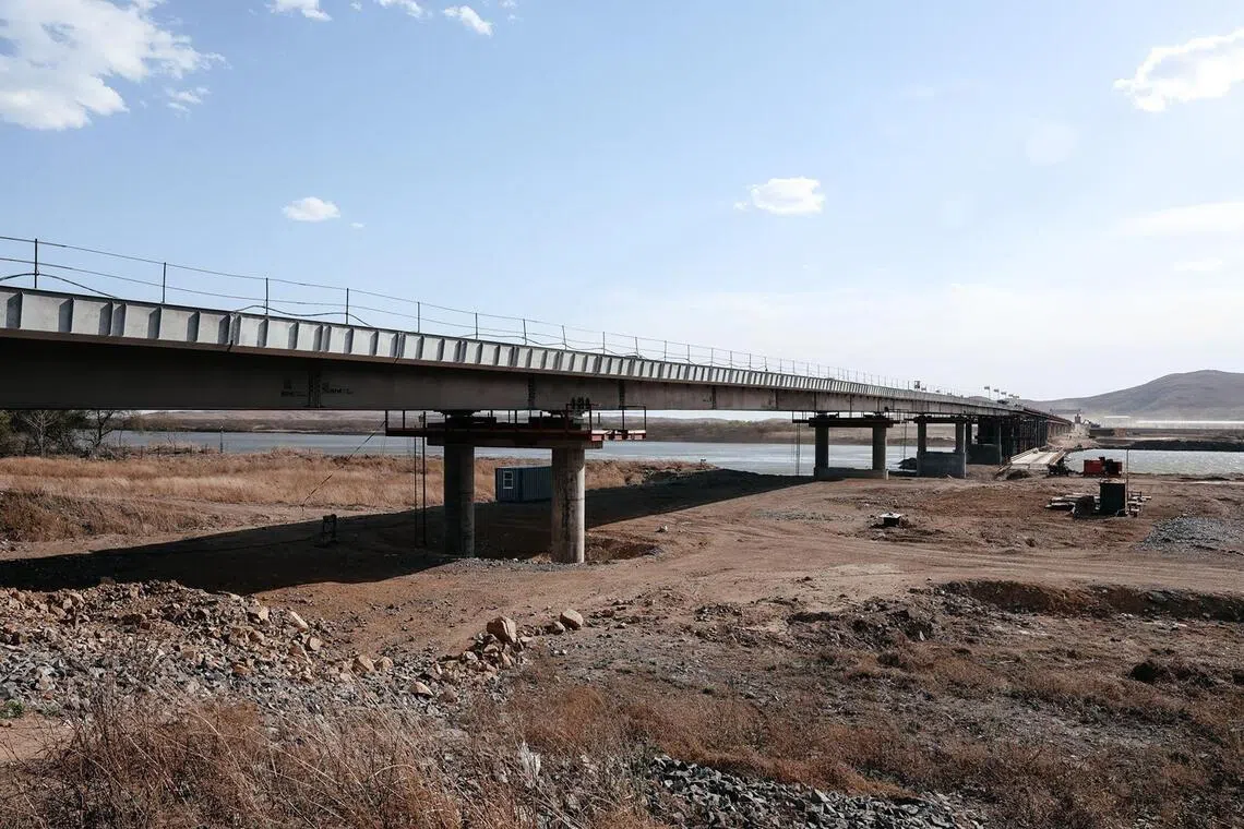 The bridge, which crosses the Tumen river that marks the border between the two countries, will be able to handle up to 300 vehicles and 2,850 people a day, Russia’s transport ministry said.