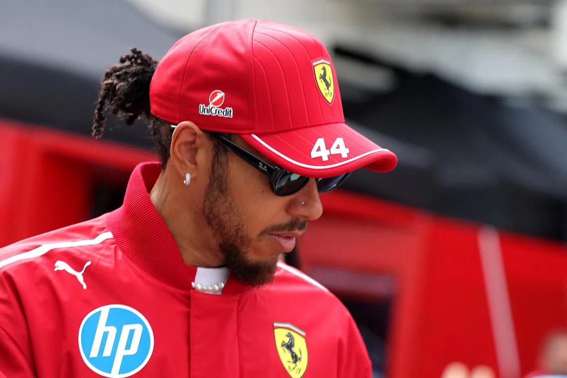 Formula One F1 - Azerbaijan Grand Prix - Baku City Circuit, Baku, Azerbaijan - September 21, 2025 Ferrari's Lewis Hamilton arrives before the race REUTERS/Anton Vaganov