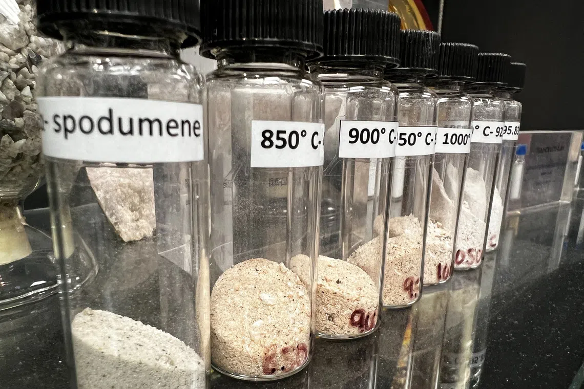 A display shows lithium ore spodumene, mined in Western Australia, which is used in the production of batteries for electric vehicles, in Perth, Australia, May 24, 2024. REUTERS/Melanie Burton