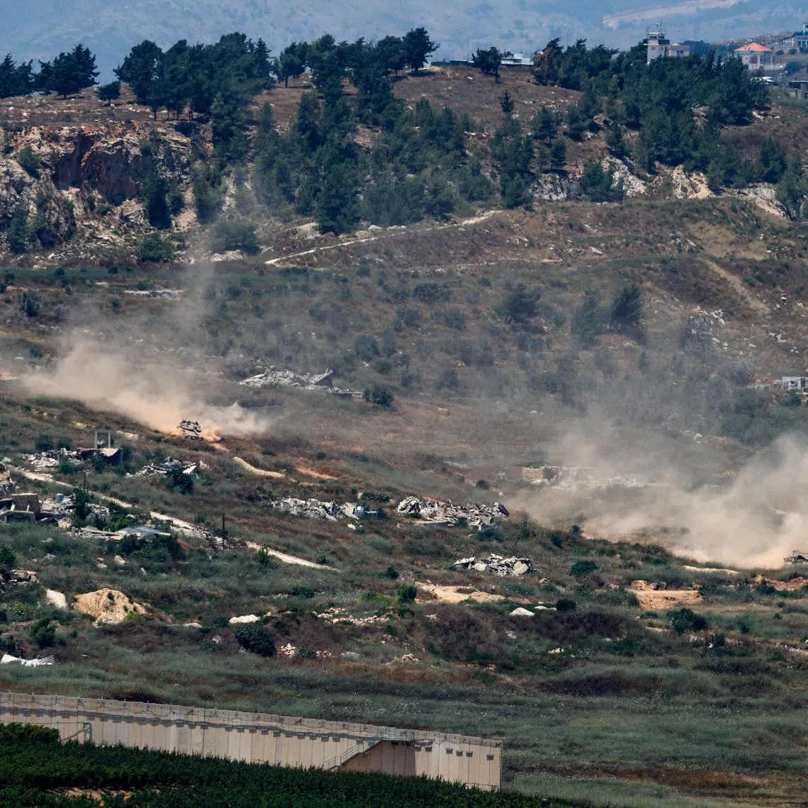 Israeli tanks manoeuvre in Lebanon, after Israel and Lebanon signed a framework agreement following U.S.-mediated talks, as seen from northern Israel, June 27, 2026. REUTERS/Amir Cohen