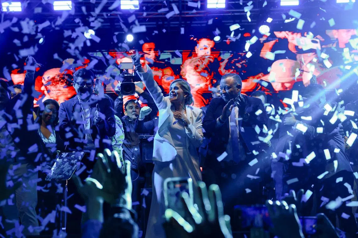Presidential candidate Laura Fernandez of the Sovereign People's Party (PPSO) celebrates onstage as she leads the general election, in San Jose, Costa Rica, February 1, 2026. REUTERS/Raquel Cunha
