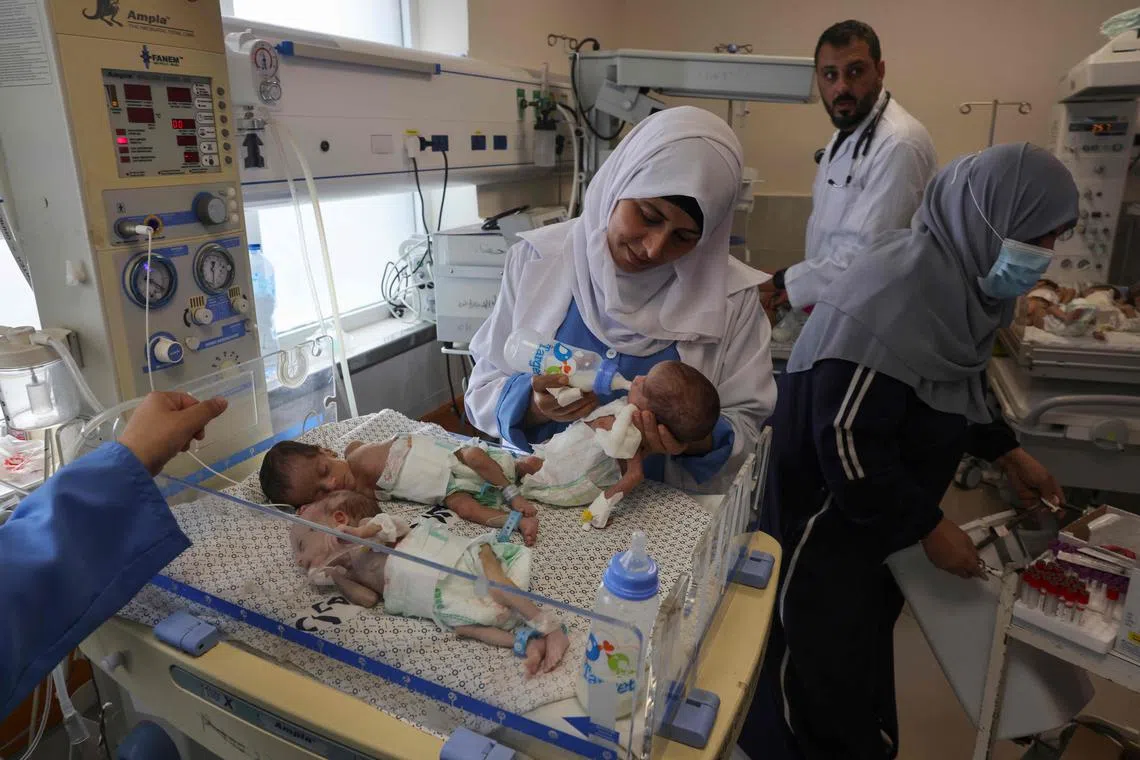Palestinian medics care for premature babies evacuated from Al Shifa hospital to the Emirates hospital in Rafah. 