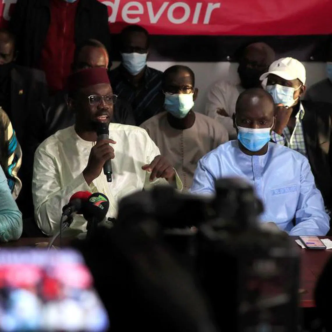 Opposition leader Ousmane Sonko, who was arrested on sexual assault accusations and released on bail under judicial supervision, speaks during a news conference in Dakar, Senegal March 8, 2021. REUTERS/Cooper Inveen/File Photo