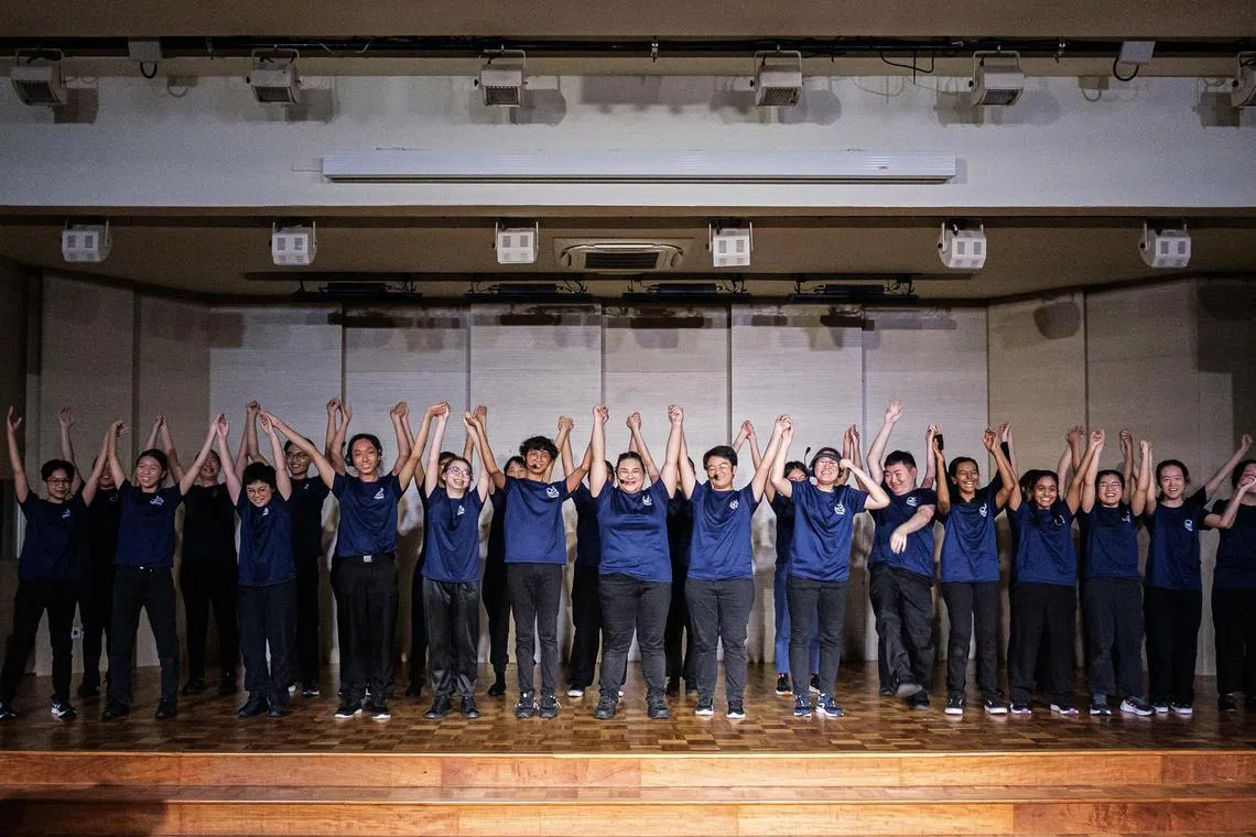 cwsign - A group photo of Singapore Polytechnic's sign language club members after the annual SIGNature performance, which involves the performing of songs using sign language, in 2024.

PHOTO: Courtesy of Singapore Polytechnic's sign language club