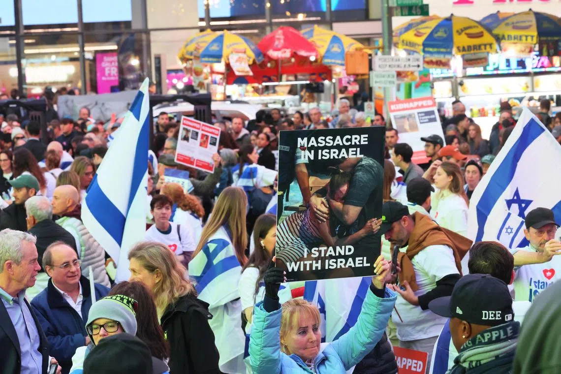 Demonstrators demand the release of hostages taken by Hamas, in Times Square, New York City, on Oct 19.