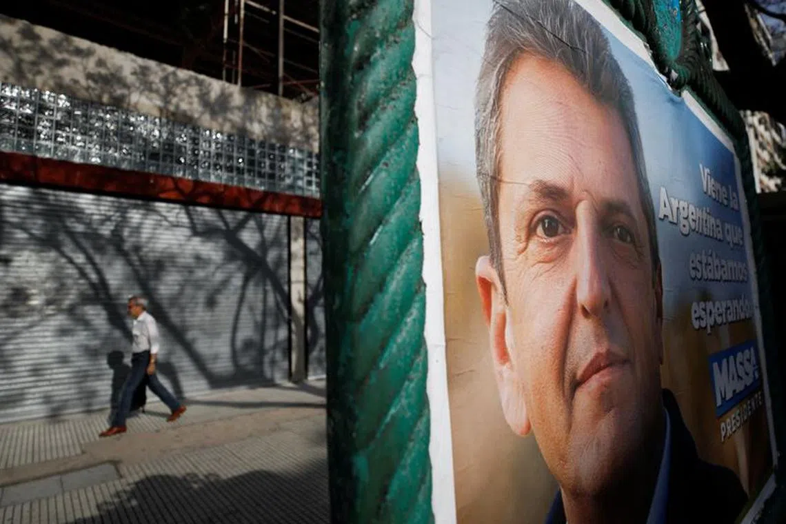 FILE PHOTO: A campaign poster of Argentine presidential candidate Sergio Massa is pictured ahead of the November 19 runoff election, in Buenos Aires, Argentina November 15, 2023. REUTERS/Agustin Marcarian/File Photo