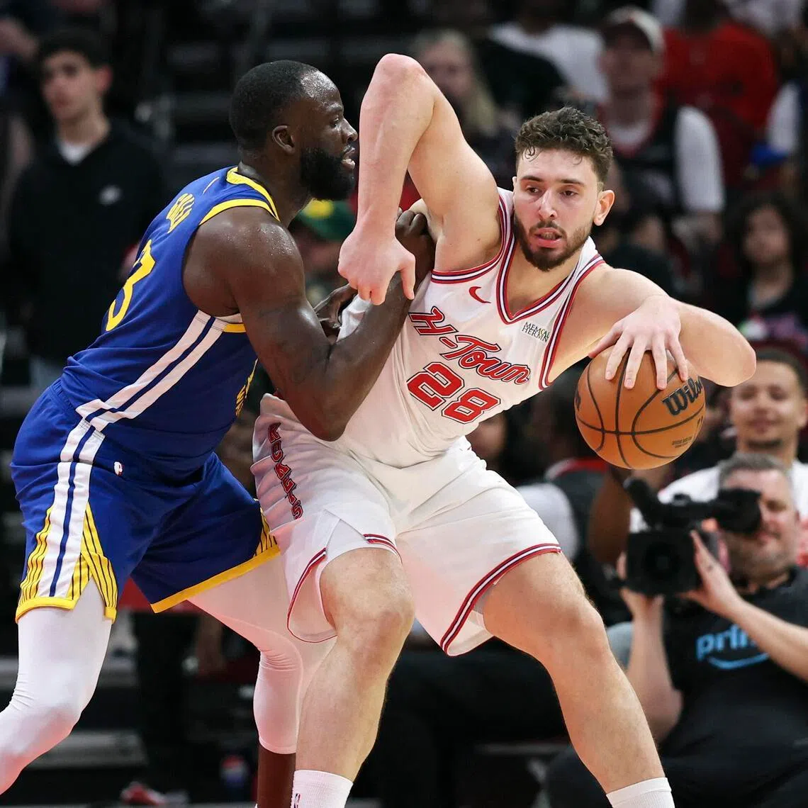 Golden State Warriors forward Draymond Green defending against centre Alperen Sengun during the shock 115-113 overtime victory over the Houston Rockets at Toyota Center on March 5, 2026.