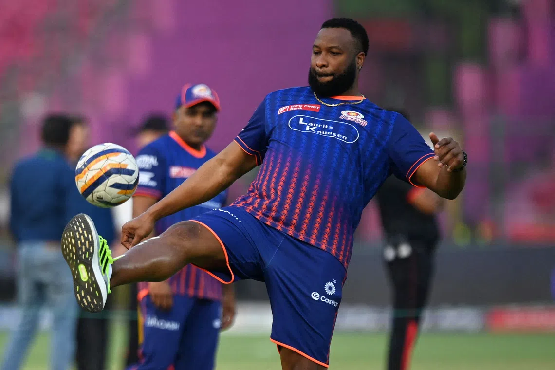 FILE PHOTO: Cricket - Indian Premier League - IPL - Punjab Kings v Mumbai Indians - Sawai Mansingh Stadium, Jaipur, India - May 26, 2025 Mumbai Indians batting coach Kieron Pollard during the warm up before the match REUTERS/Abhijit Addya/File Photo