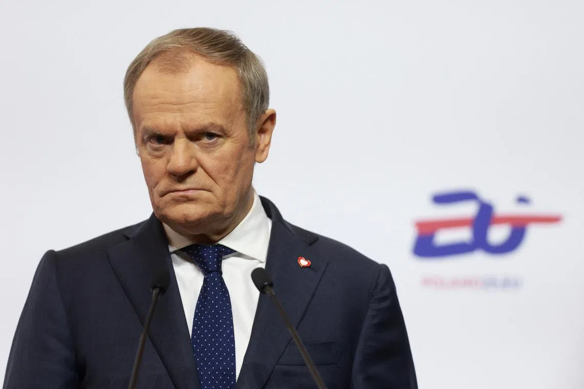 FILE PHOTO: Polish Prime Minister Donald Tusk attends a press conference with European Commission President Ursula von der Leyen, at the European Solidarity Center in Gdansk, Poland February 7, 2025. REUTERS/Lukasz Glowala/ File Photo