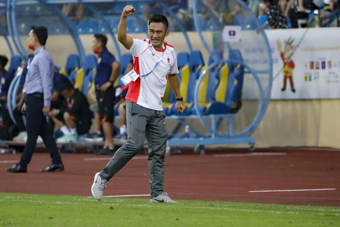 Singapore head coach Nazri Nasir urging his side on after their stoppage-time equaliser against Laos at the SEA Games. They drew 2-2 with Laos.