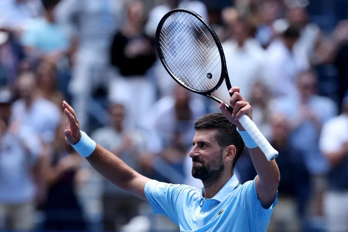 Serbia's Novak Djokovic celebrates his win against Zachary Svajda, of the US.