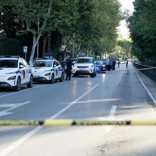 Police secure the perimeter outside Tirana Appeal Court after a judge was shot dead, in Tirana, on Oct 6, 2025.