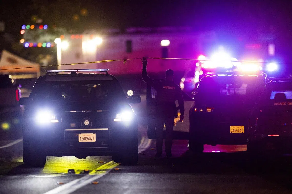 epa10817032 Law enforcement officers stand guard next to Cook's Corner biker bar in Trabuco Canyon, California, USA, 23 August 2023. According to first reports at least four people died and several were injured in a shooting at Cook's Corner.  EPA-EFE/ETIENNE LAURENT
