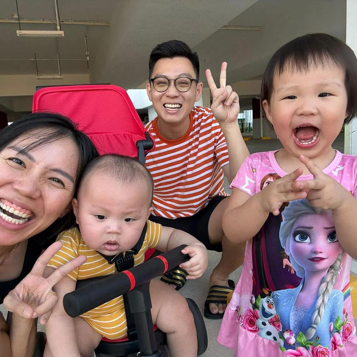 thbaby19 - Ms Joanna Wee, a 35-year-old physiotherapist, her husband Gary Chua, a 35-year-old facilities management director, and their children. Ms Wee is holding her son, Matthias., who is now 7 months old. While Cara, 2, is posing for the picture.

Credit: Joanna Wee