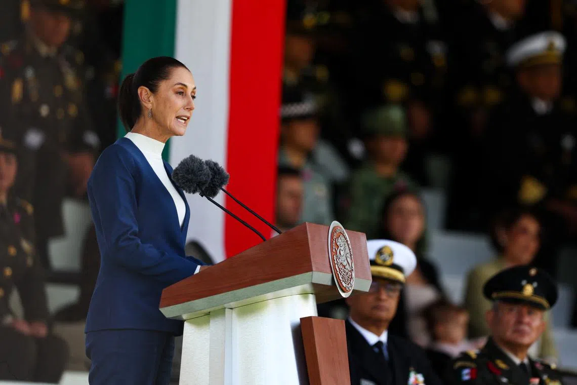 FILE PHOTO: Mexico's President Claudia Sheinbaum speaks, as Mexican Armed Forces salute her as Commander-in-Chief during a ceremony at Military Camp 1, in Mexico City, Mexico October 3, 2024. REUTERS/Raquel Cunha/File Photo