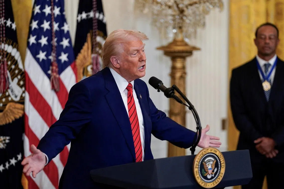U.S. President Donald Trump speaks during a reception honouring Black History Month in the East Room of the White House in Washington, D.C., U.S., February 20, 2025. REUTERS/Kent Nishimura