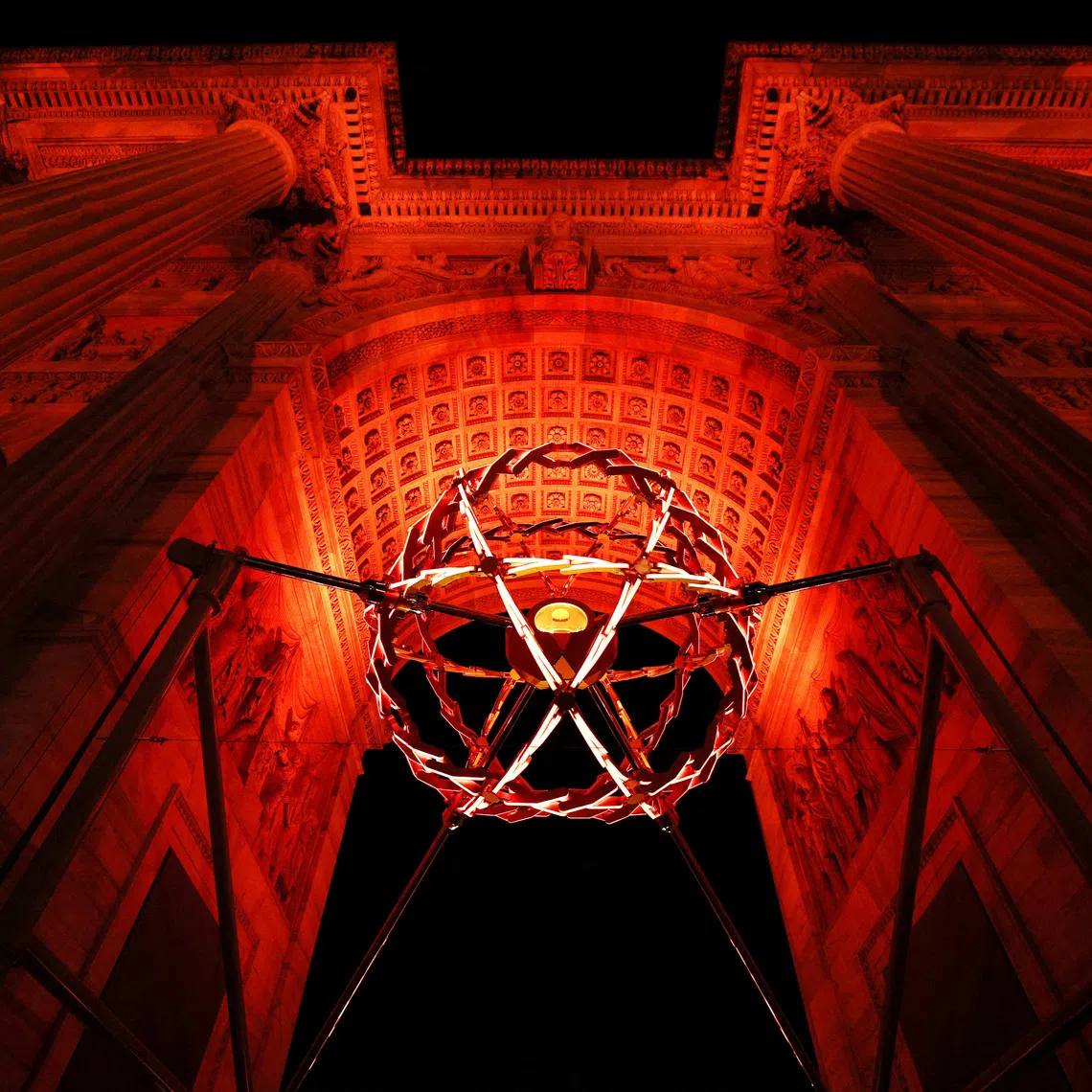 FILE PHOTO: Milano Cortina 2026 Olympics - Opening Ceremony - Arco della Pace, Milan, Italy - February 06, 2026. The Olympic flame is seen lit in the cauldron during the opening ceremony REUTERS/Guglielmo Mangiapane/File Photo