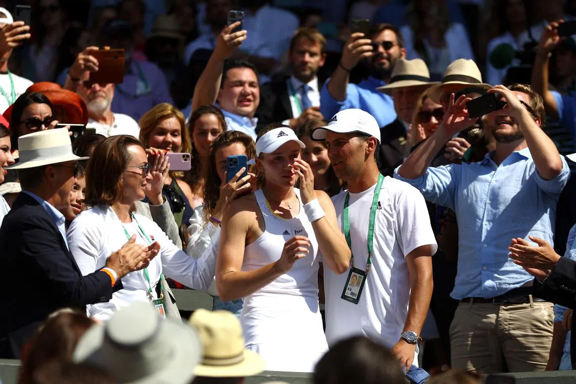 FILE PHOTO: Tennis - Wimbledon - All England Lawn Tennis and Croquet Club, London, Britain - July 9, 2022  Kazakhstan's Elena Rybakina celebrates with coach Stefano Vukov after winning the women's singles final against Tunisia's Ons Jabeur REUTERS/Hannah Mckay/File Photo