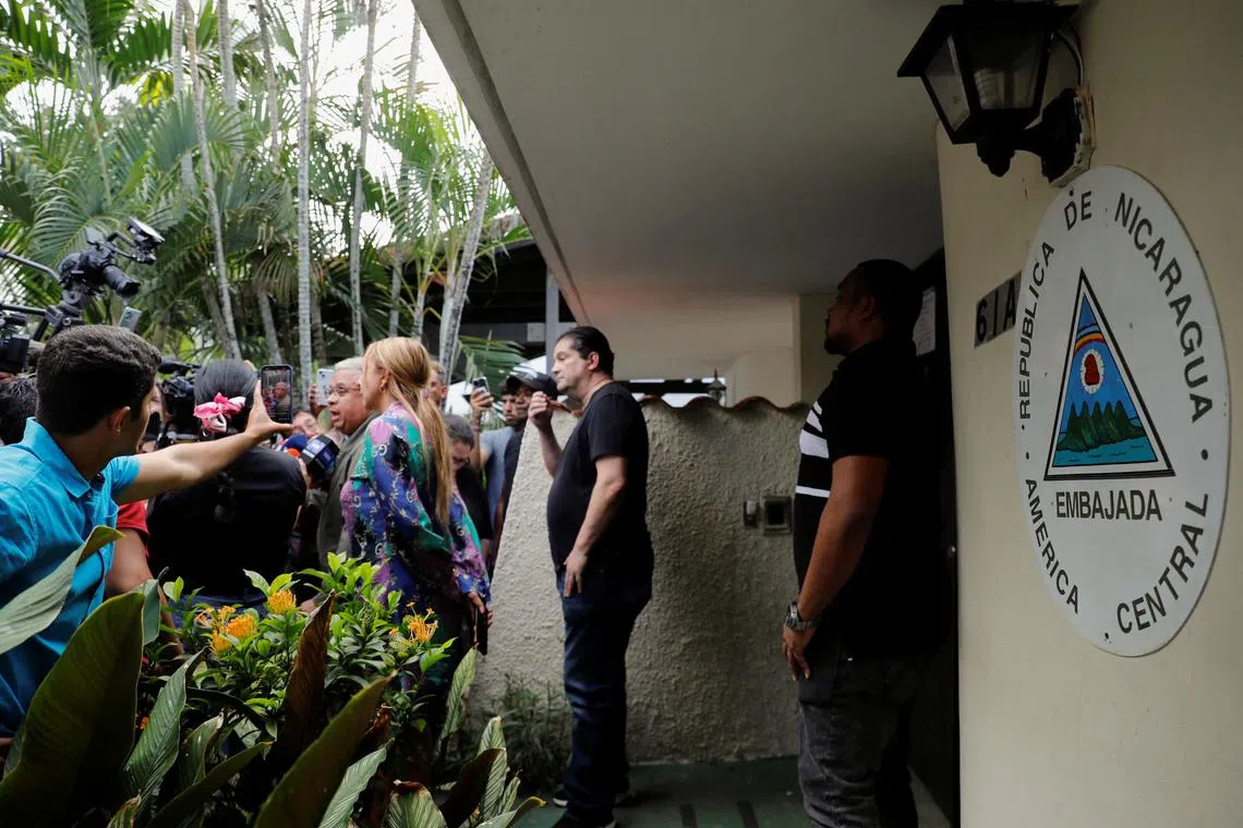 FILE PHOTO: Panama's former President Ricardo Martinelli's lawyer Roniel Ortiz, speaks with members of the media outside of the Nicaraguan embassy in Panama City, after Martinelli requested asylum at the Nicaraguan embassy, in Panama City, Panama, February 7, 2024. REUTERS/Aris Martinez/File Photo