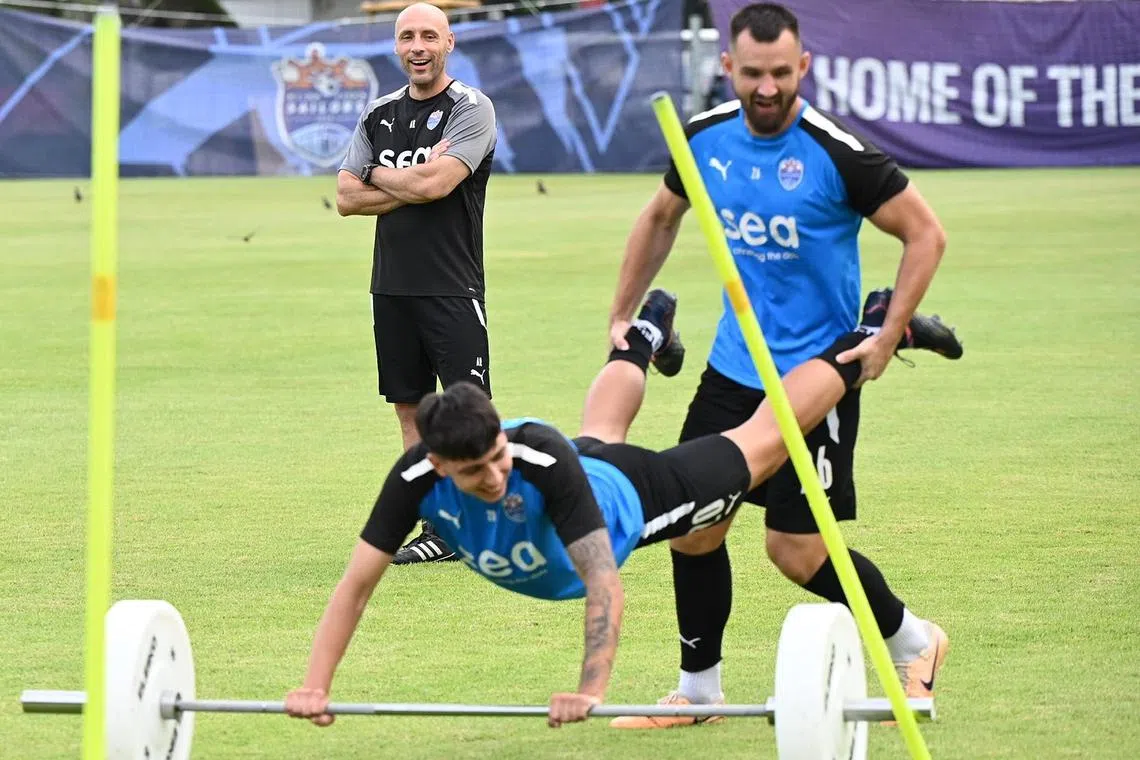 Aleksandar Rankovic (in black), head coach of the Lion City Sailors observing training on May 4 at Lion City Sailors Training Centre. 