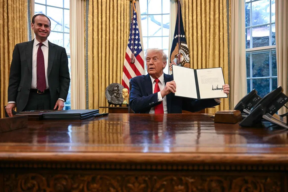 US President Donald Trump speaks to the press after signing an executive order to create a US sovereign wealth fund, in the Oval Office of the White House on February 3, 2025, in Washington, DC. (Photo by Jim WATSON / AFP)