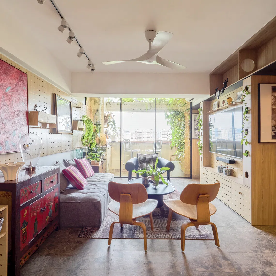 Home owner Winston Lim shares his compact but cleverly designed Pasir Ris flat with two cats.