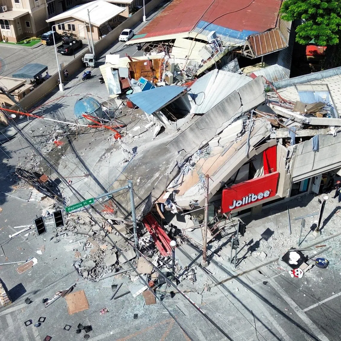 A drone view shows a collapsed building after a magnitude 7.8 quake in General Santos, Mindanao Island, Philippines, June 8, 2026. GenSan DEV/Handout via REUTERS    THIS IMAGE HAS BEEN SUPPLIED BY A THIRD PARTY. NO RESALES. NO ARCHIVES. MANDATORY CREDIT     TPX IMAGES OF THE DAY
