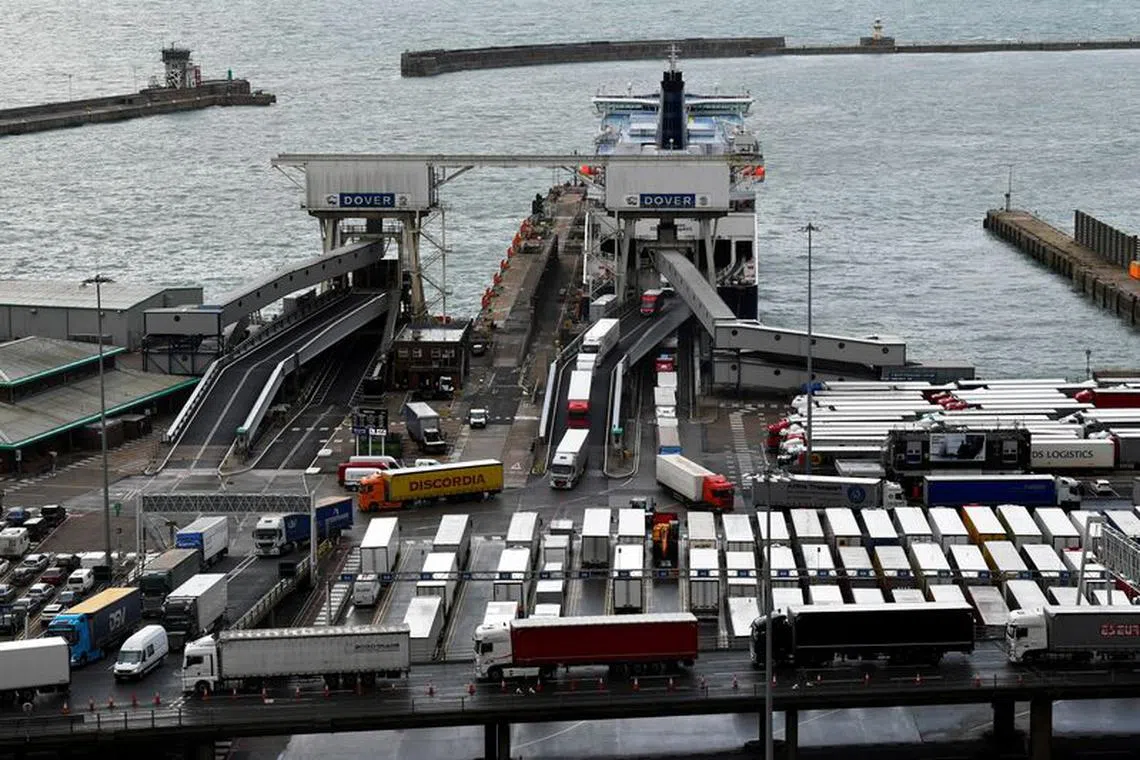 FILE PHOTO: Lorries disembark from a cross channel ferry at the Port of Dover, in Dover, Britain September 24, 2020. REUTERS/Toby Melville/File Photo