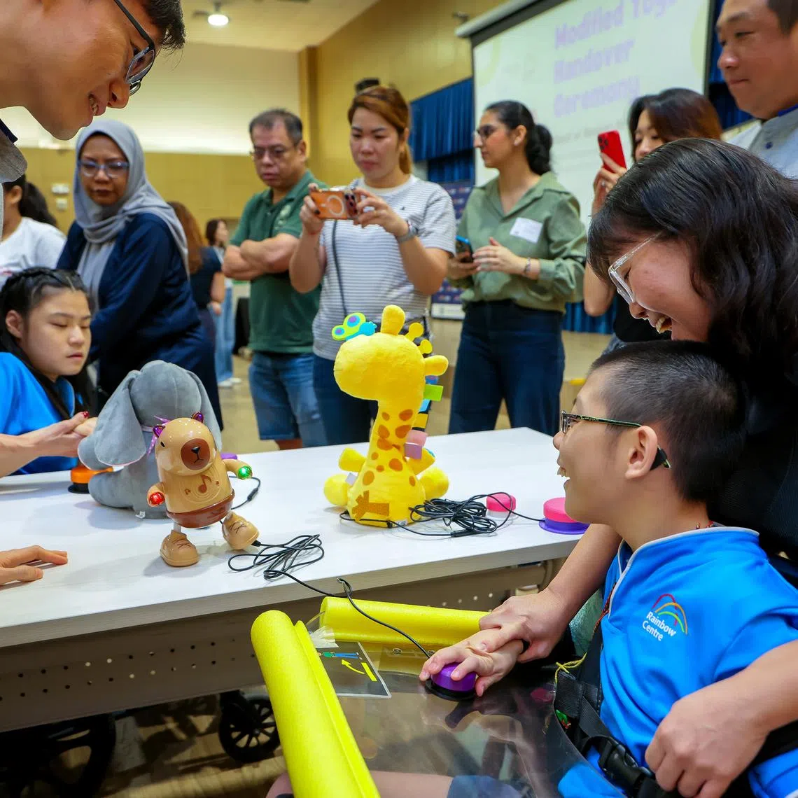 70 modified toys were presented to children aged seven to 18 from Rainbow Centre on May 29.