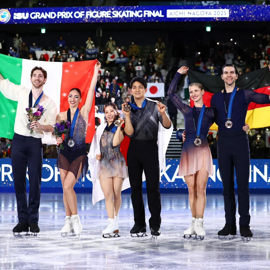 Figure Skating - ISU Grand Prix of Figure Skating - Grand Prix Final - Aichi International Arena, Nagoya, Japan - December 5, 2025 Japan's Riku Miura and Ryuichi Kihara celebrate with their medals after winning the pairs free skating alongside second placed Sara Conti and Niccolo Macii of Italy and third placed Minerva Fabienne Hase and Nikita Volodin of Germany REUTERS/Issei Kato