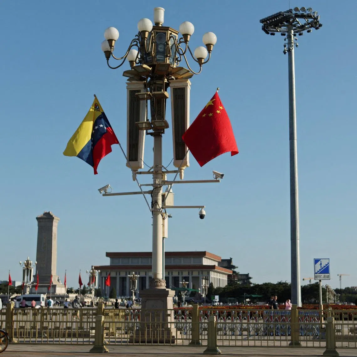 FILE PHOTO: Flags of Venezuela and China flutter over Tiananmen Square during Venezuelan President Nicolas Maduro's visit, in Beijing, China September 12, 2023. REUTERS/Florence Lo/File Photo