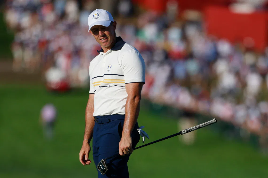 Golf - The 2025 Ryder Cup - Bethpage Black Golf Course, Farmingdale, New York, United States - September 28, 2025 Team Europe's Rory McIlroy reacts after his putt on the 18th hole during the singles IMAGN IMAGES via Reuters/Peter Casey