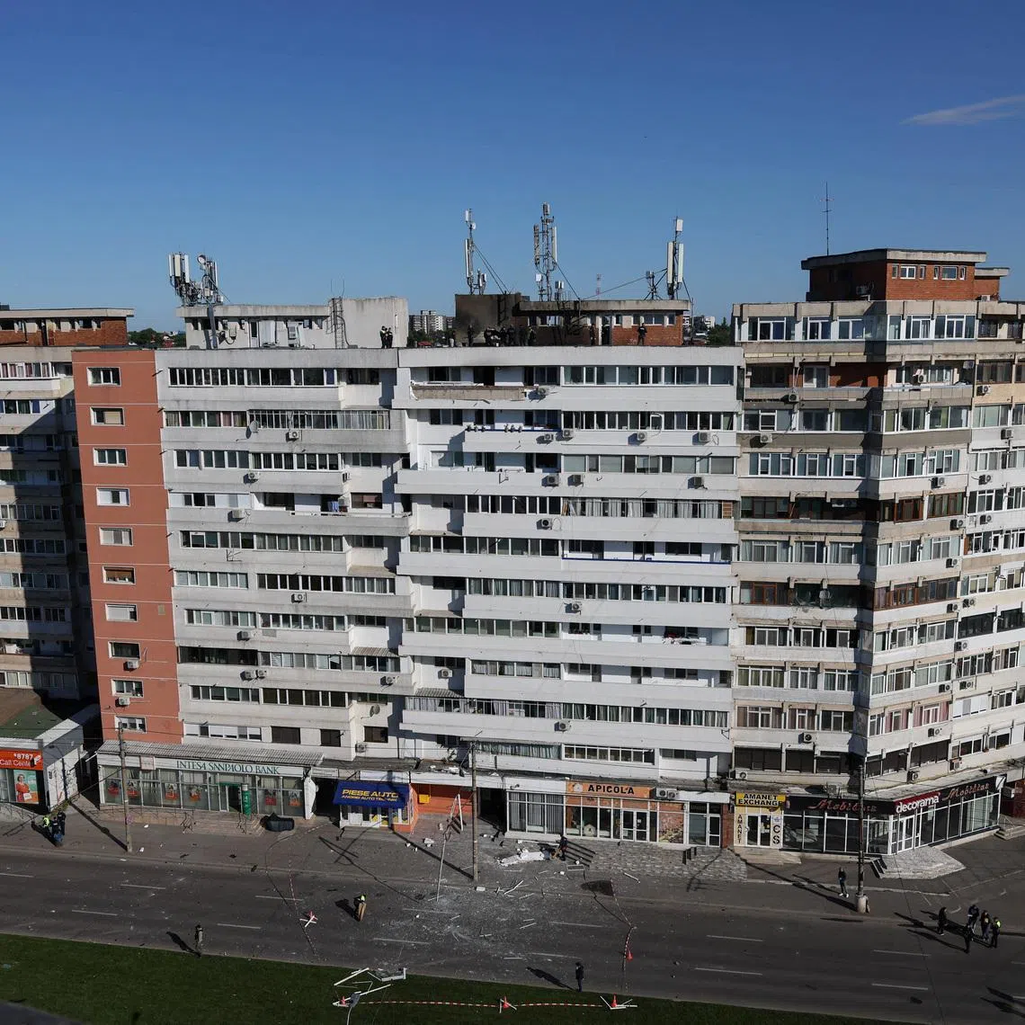 Romanian law enforcement officers work on the site of an explosion at a residential block of flats following a drone hit close to the border with Ukraine, in Galati, Romania, May 29, 2026. Inquam Photos/George Calin via REUTERS
