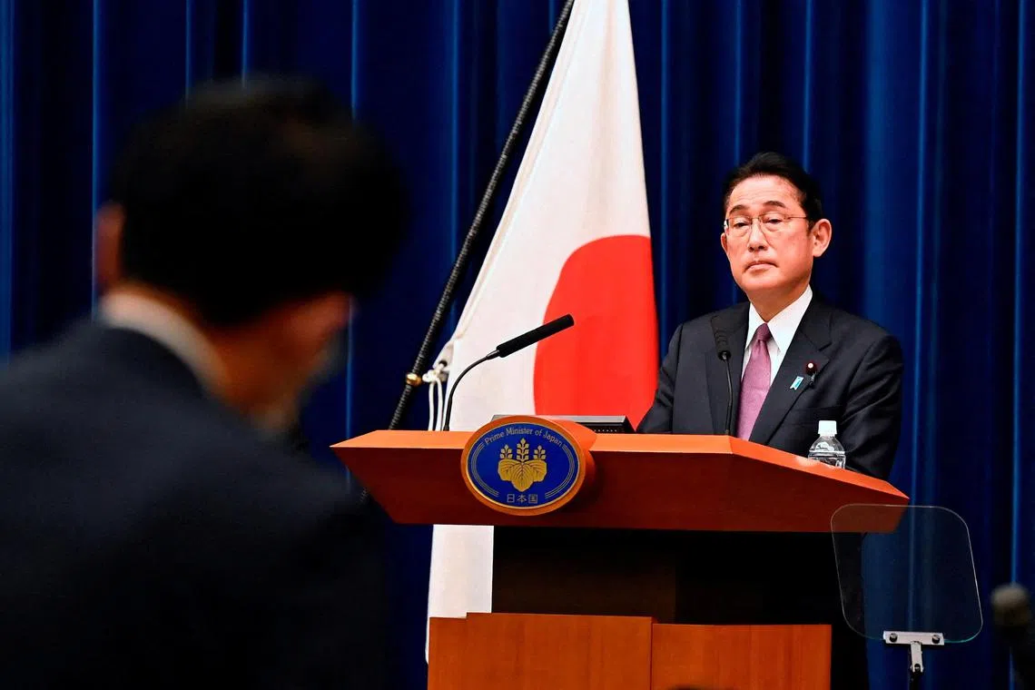 FILE PHOTO: Japan's Prime Minister Fumio Kishida attends a press conference in Tokyo, Japan, on December 16, 2022, addressing some topics such as National Security Strategy, political and social issues facing Japan in today's World crisis. David Mareuil/Pool via REUTERS/File Photo