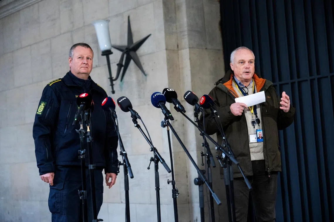Danish officials give a press briefing on the coordinated police action in Denmark.