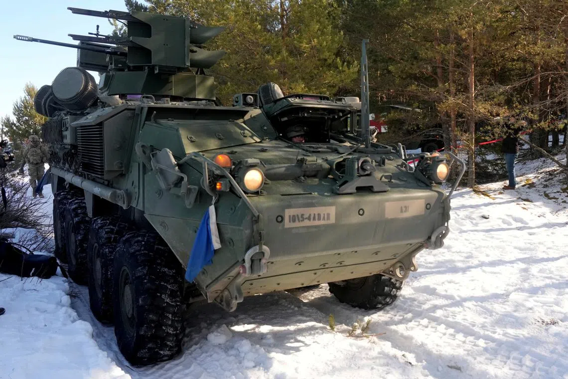 U.S. troops prepare to fire Stinger missiles from their Stryker armored fighting vehicle during Saber Strike military drill in Rutja, Estonia March 10, 2022. REUTERS/Ints Kalnins/ File Photo