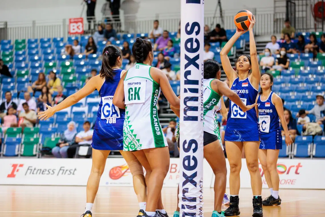 Singapore's Amandeep Kaur Chahal (with ball) in action during the Republic's 58-36 victory over Cook Islands at the Mirxes Nations Cup on Oct 23, 2023.
