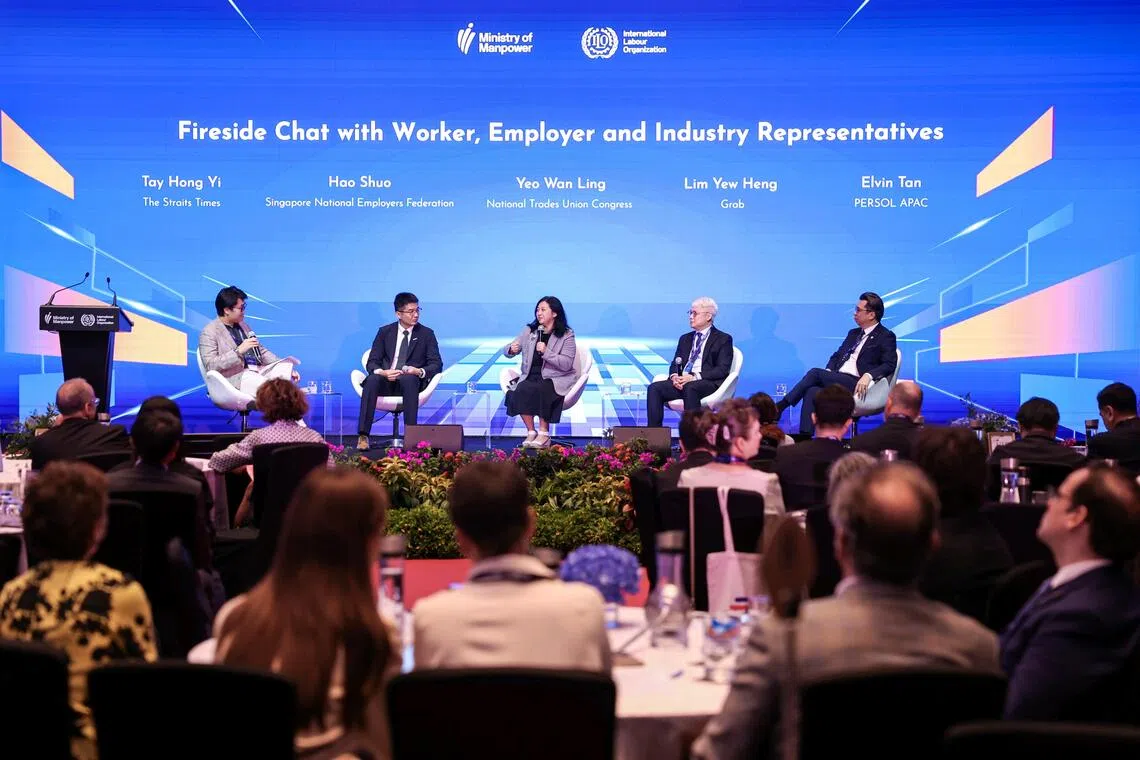 (From left) ST correspondent Tay Hong Yi moderating a fireside chat with SNEF CEO Hao Shuo, NTUC assistant secretary-general Yeo Wan Ling, Grab’s group managing director Lim Yew Heng and Persol's regional head of operations and director for the Asia-Pacific region Elvin Tan.