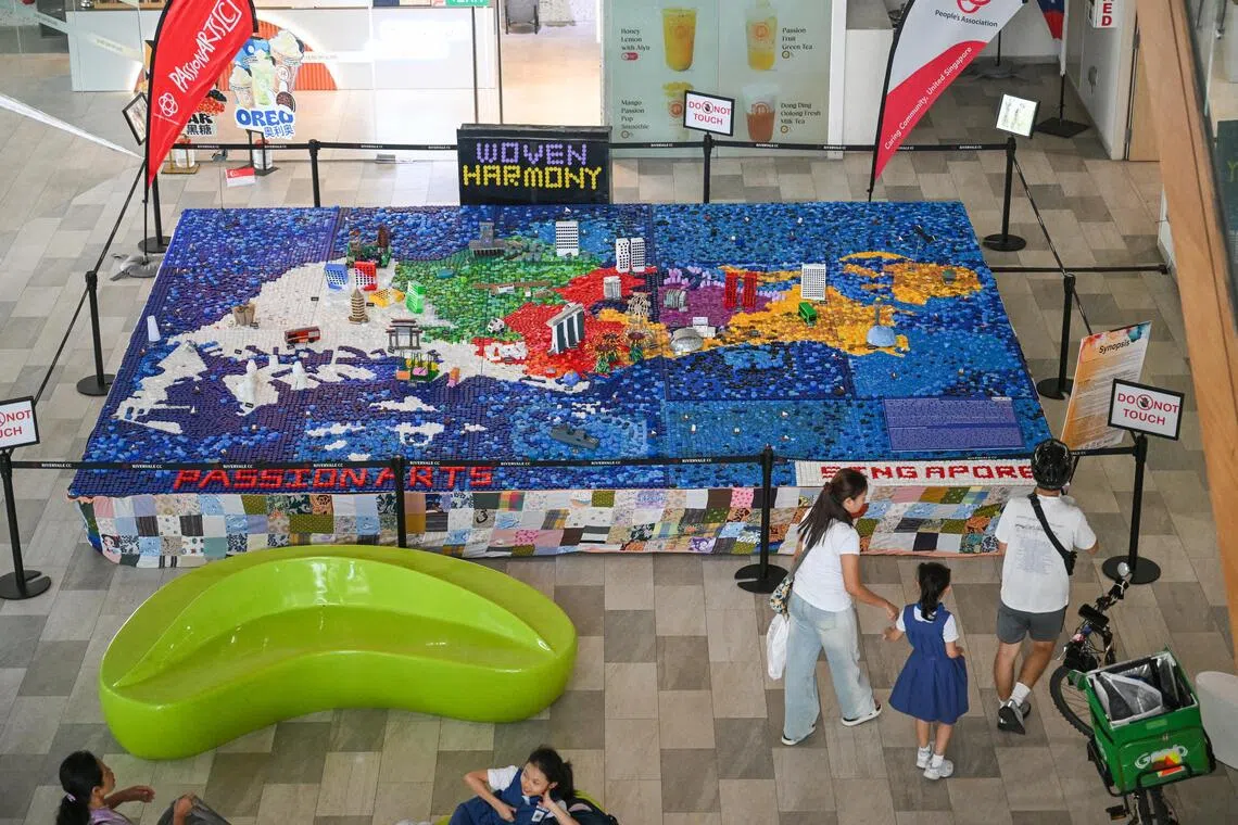 Dotting the map is a 22m-long quilt, sewn from donated pieces of fabric contributed by residents.