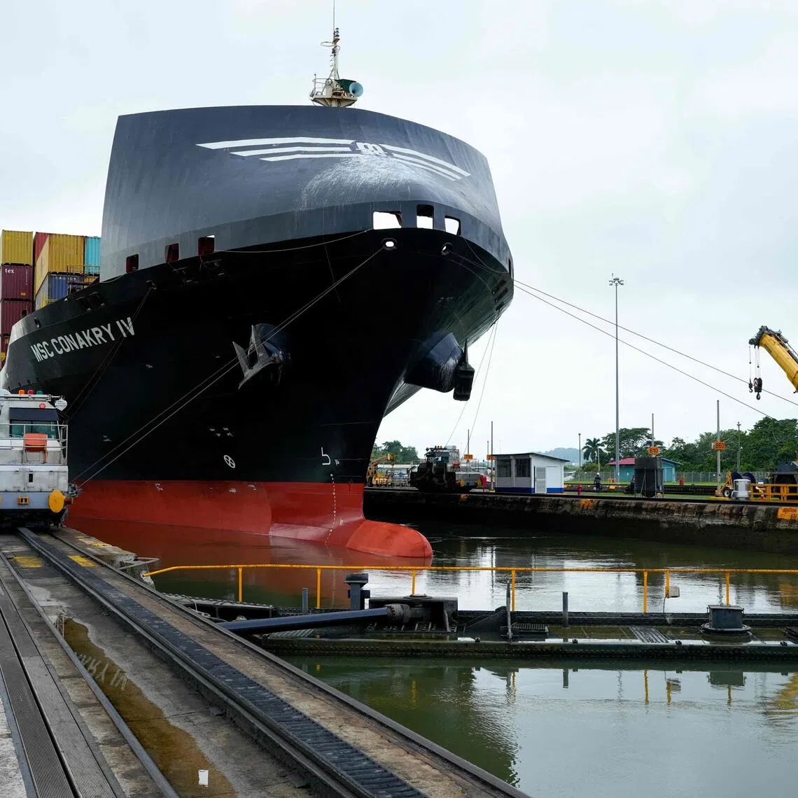 The Panama Canal Authority said low water levels in the two artificial lakes that feed the canal forced it to act.