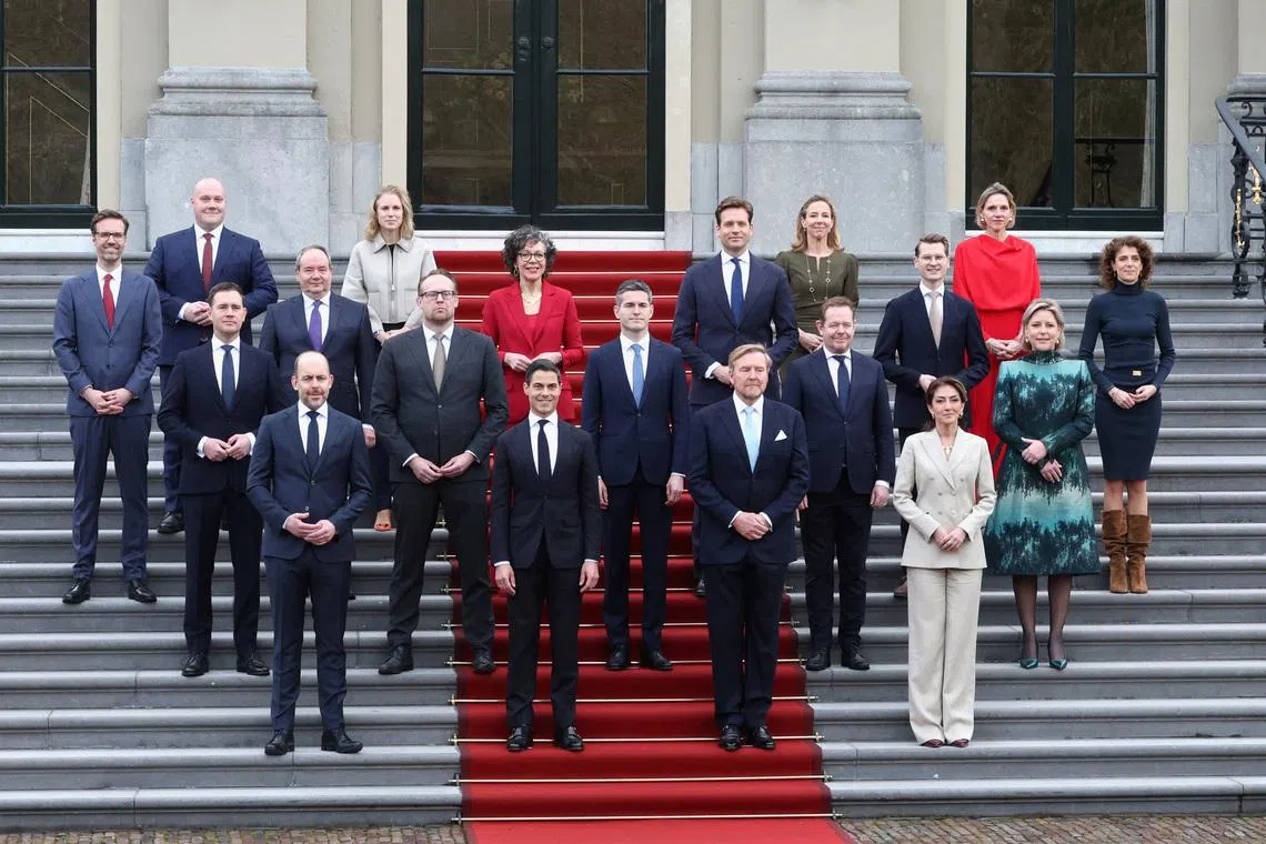 King Willem-Alexander of the Netherlands poses with new Dutch Prime Minister Rob Jetten and the new members of the Dutch Government at the Palace Huis ten Bosch, in The Hague, Netherlands, February 23, 2026. REUTERS/Peter Lous